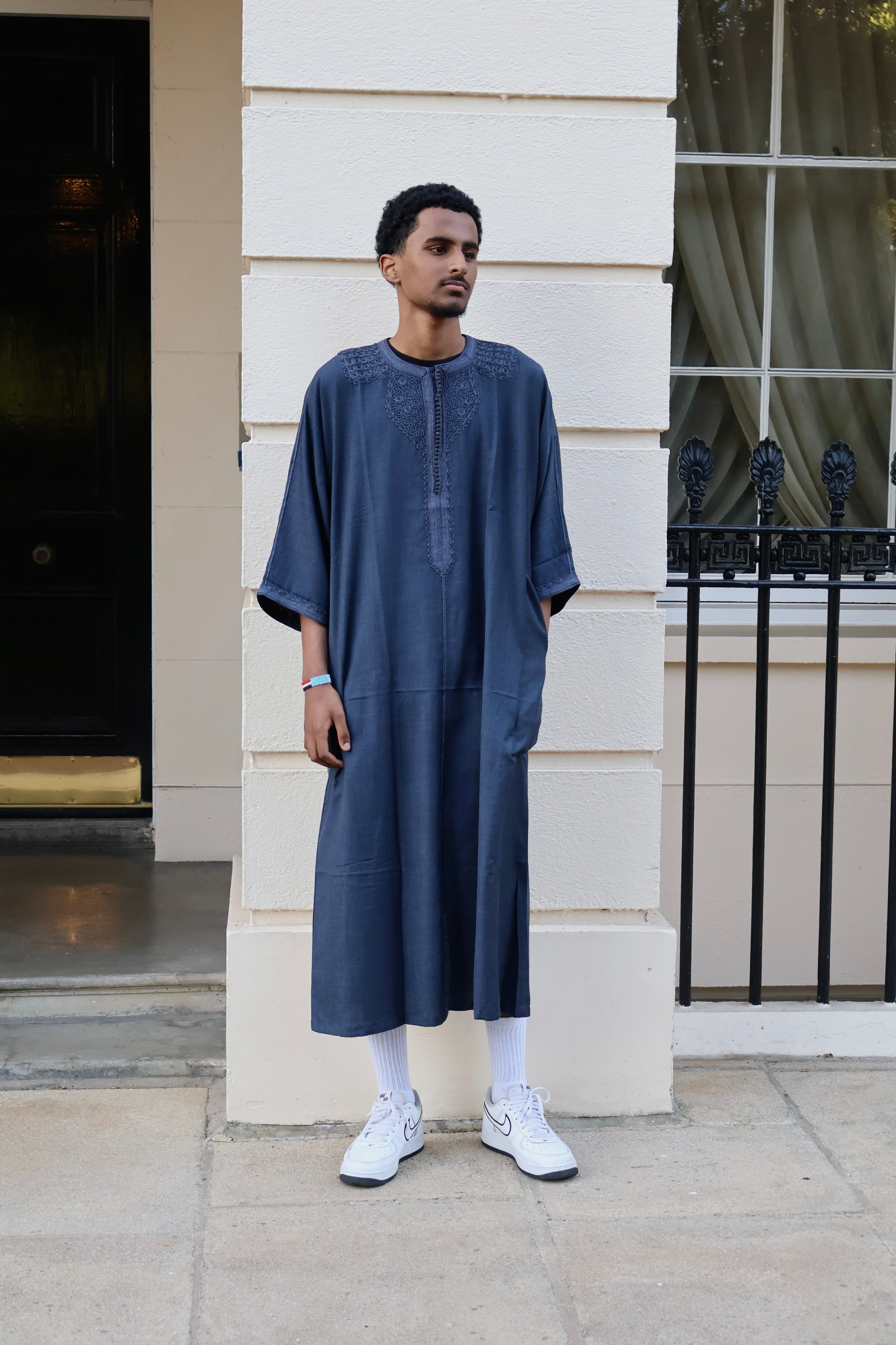 Full-length view of a man wearing a men&