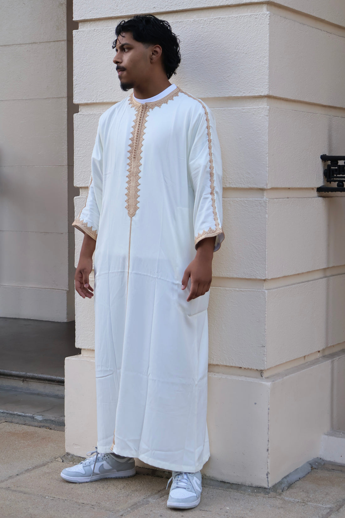 Full-length view of a man wearing a men&