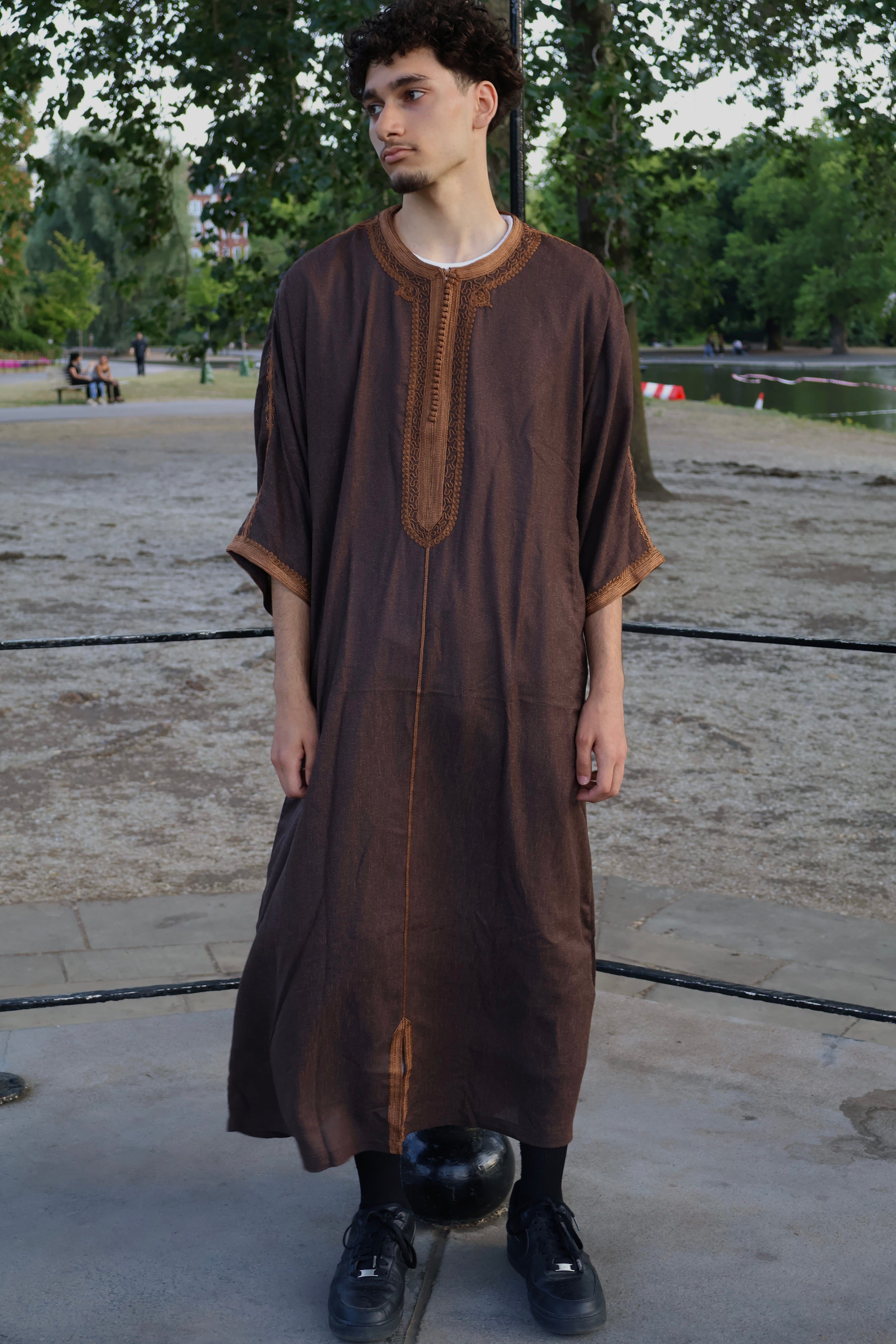 Full-length shot of a man wearing a stately brown men&