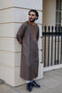 Side profile of a man wearing a 