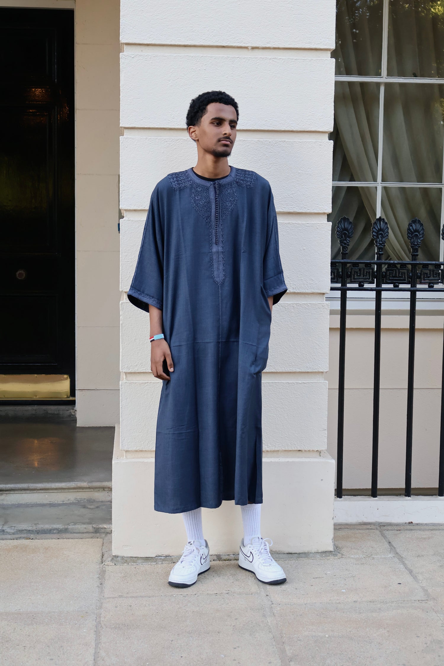 Full-length view of a man wearing a men&