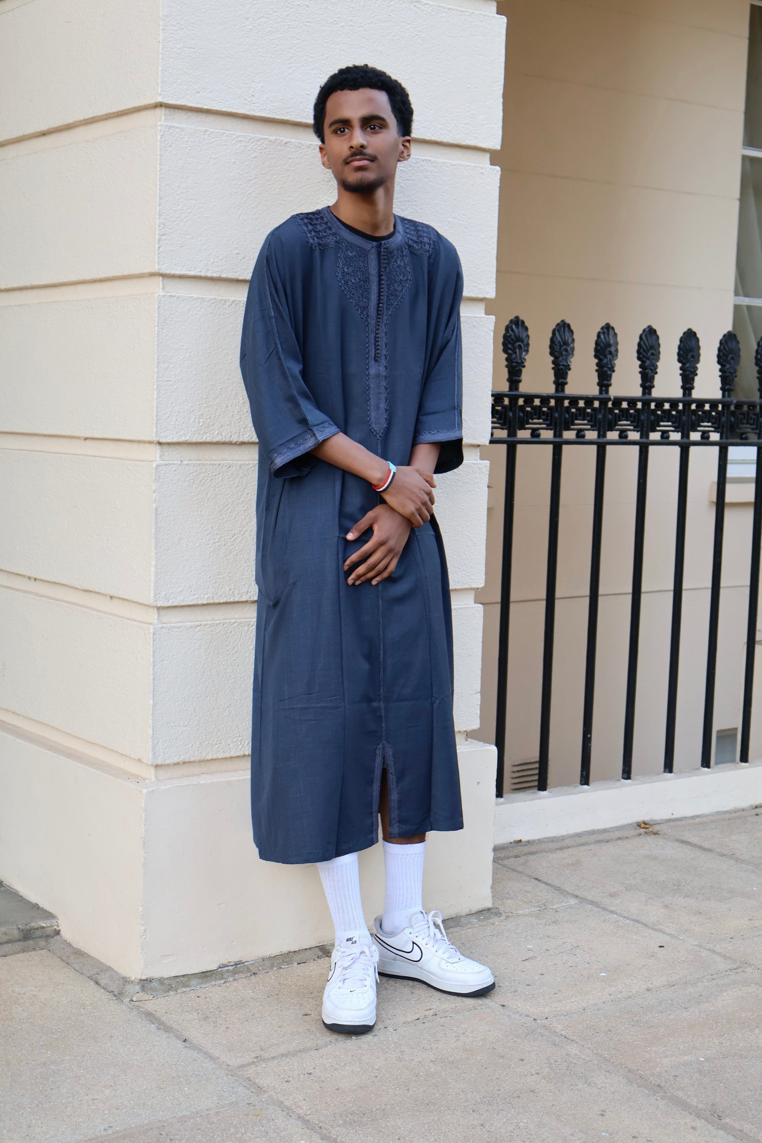 Man standing outdoors, wearing a men&