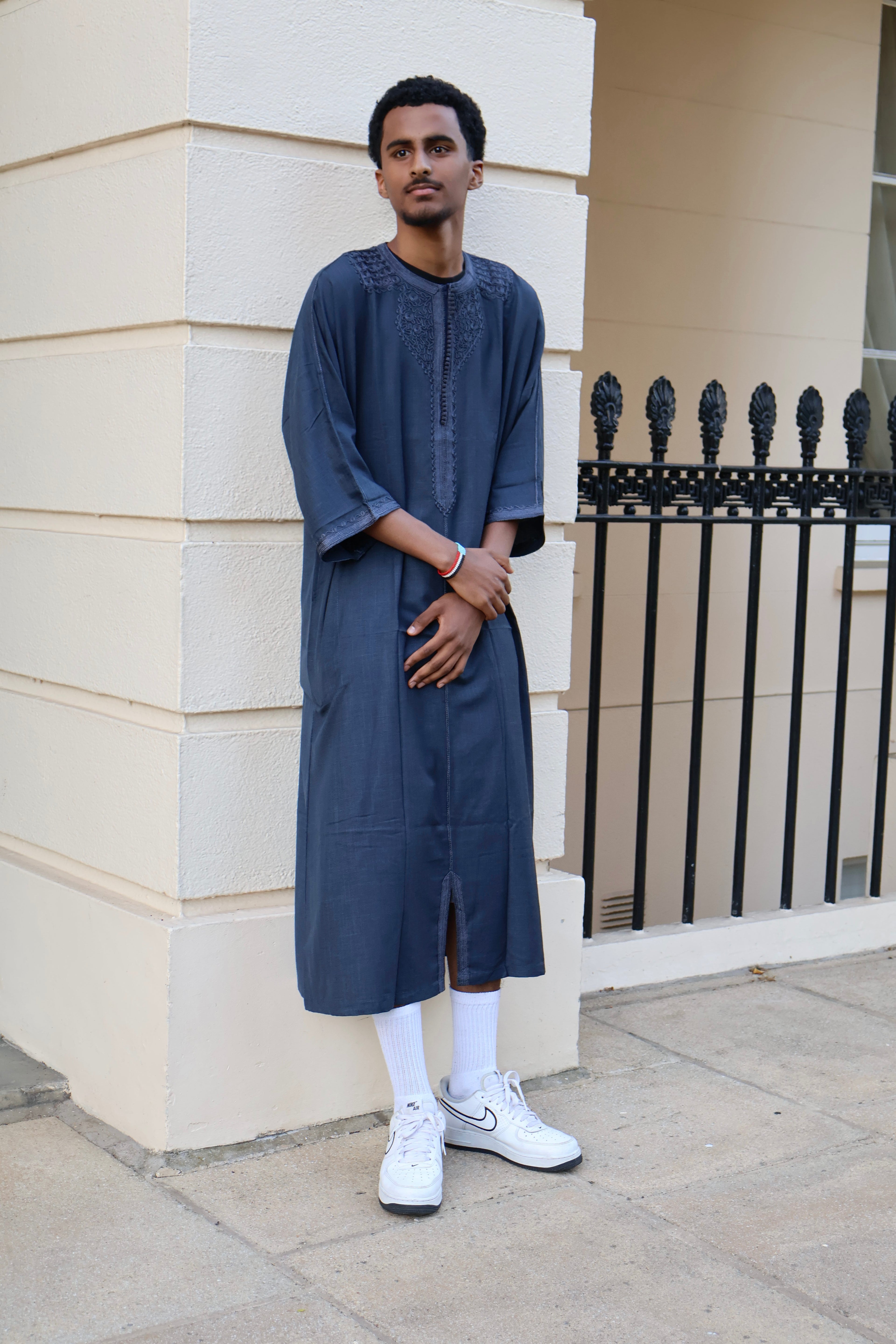 Man standing outdoors, wearing a men&